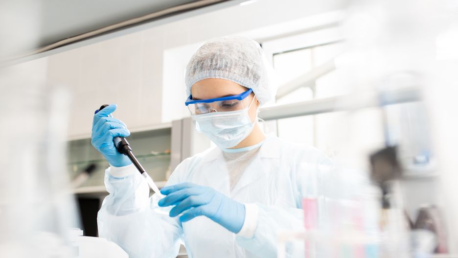 Microbiologist at work
Serious concentrated female microbiologist in sterile clothing and safety goggles sitting at table and dropping reagent in petri dish while doing research in laboratory
people, woman, young, adult, science, experiment, clinic, laboratory, research, medical, chemistry, biology, pharmacy, pharmaceutical, looking, biohazard, glove, protective, cap, mask, concentrated, goggles, dropping, petri dish, microbiology, biotechnology, researcher, working, sterile