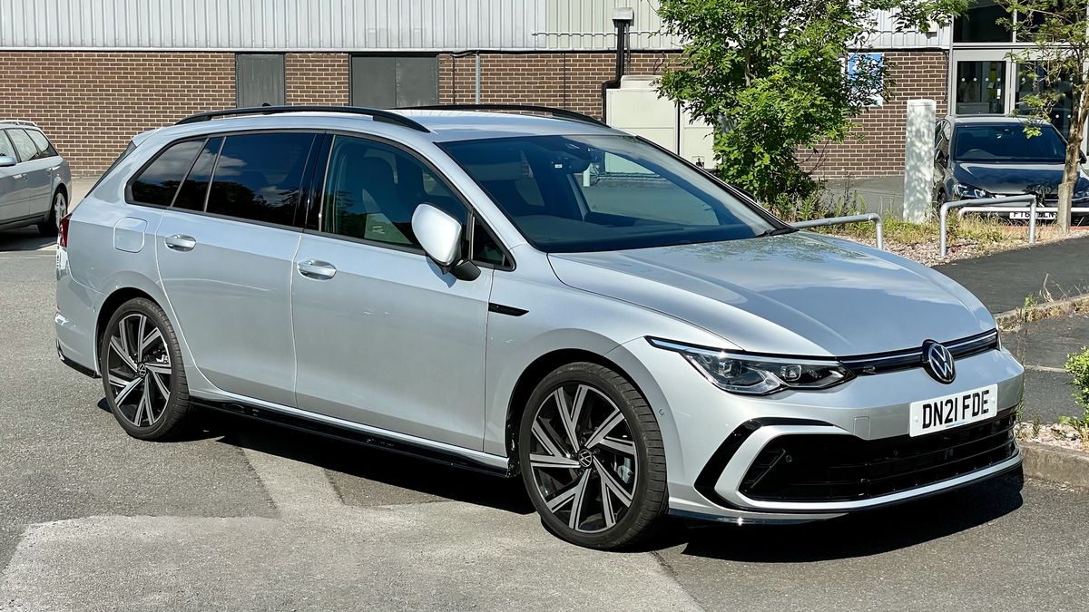 Staffordshire, England - 26th June 2021: A new Volkswagen Golf Mk8 estate car in R-Line trim parked at a dealership.