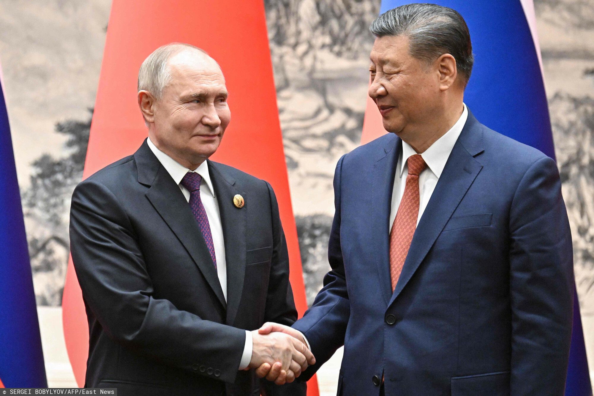 Temporary
TOPSHOT - In this pool photograph distributed by the Russian state agency Sputnik, Russia's President Vladimir Putin and China's President Xi Jinping shake hands during a signing ceremony following their talks in Beijing on May 16, 2024. (Photo by Sergei BOBYLYOV / POOL / AFP) / ** Editor's note : this image is distributed by Russian state owned agency Sputnik **
SERGEI BOBYLYOV