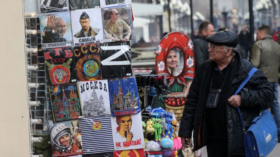 Economic Situation In RussiaMOSCOW, RUSSIA - MARCH,25 (RUSSIA OUT): A man passes by T-shirts with portraits of Russian President Vladimir Putin, 'Z' pro-war symbol and Soviet symbols in front ot a souvenir shop, March,25,2022, in Moscow, Russia. Many worldwide brands suspended any investment and sales in Russia as a result of the U.S. and EU economic sanctions. (Photo by Konstantin Zavrazhin/Getty Images)Konstantin Zavrazhinbestof, topix