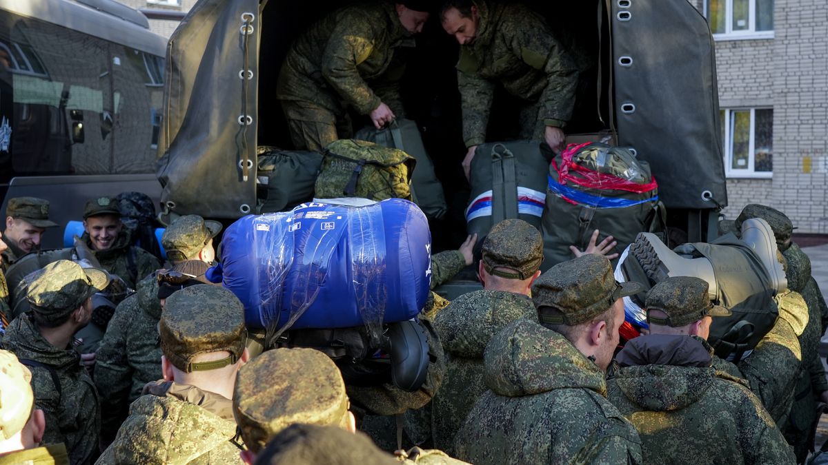 MOSCOW, RUSSIA - OCTOBER 10: Russian citizens drafted during the partial mobilization are seen being dispatched to combat coordination areas after a military call-up for the Russia-Ukraine war in Moscow, Russia on October 10, 2022. (Photo by Stringer/Anadolu Agency via Getty Images)