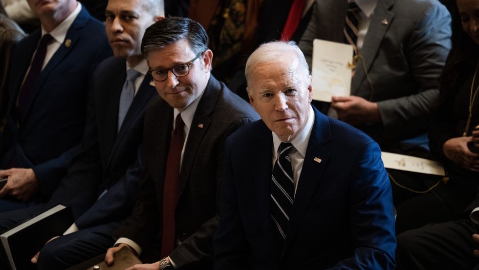 UNITED STATES - FEBRUARY 1: From right, President Joe Biden, Speaker of the House Mike Johnson, R-La., and House Minority Leader Hakeem Jeffries, D-N.Y., listen to a performance by Andrea Bocelli, during the National Prayer Breakfast in the U.S. Capitol's Statuary Hall on Thursday, February 1, 2024. (Tom Williams/CQ-Roll Call, Inc via Getty Images)