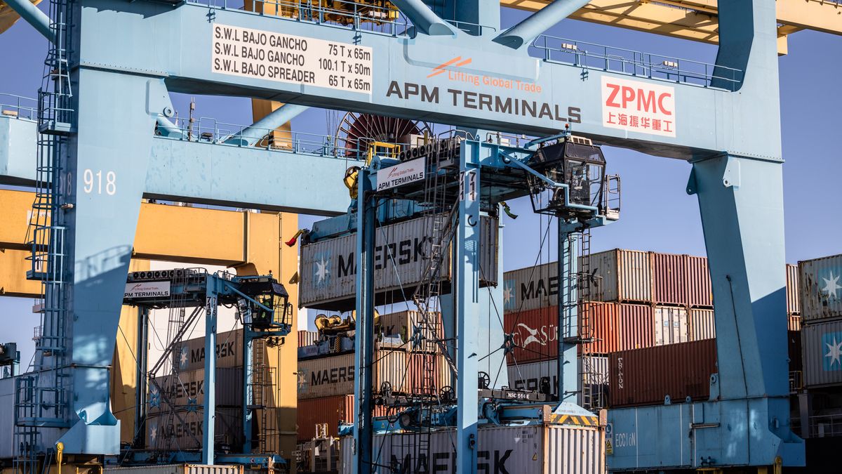 A gantry crane unloads an AP Moller-Maersk A/S shipping container at the Muelle Sur terminal, operated by APM Terminals, at the Port of Barcelona in Barcelona, Spain, on Monday, Jan. 13, 2025. The US is a big buyer of the European Union's exports which leaves Europe as one of the regions most vulnerable to US President-elect Donald Trump's threat to increase tariffs on US imports. Photographer: Angel Garcia/Bloomberg via Getty Images