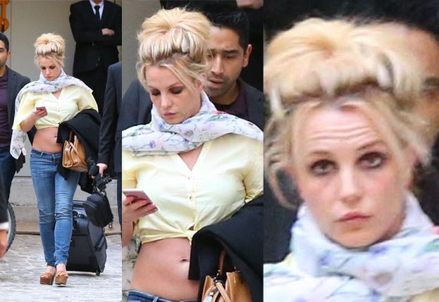 Zmęczona Britney z gołym brzuchem ciągnie za sobą walizkę (FOTO)