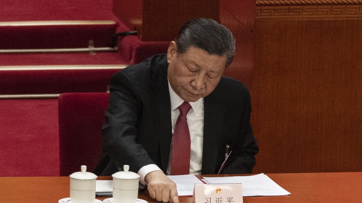 BEIJING, CHINA - MARCH 11: Chinese President Xi Jinping presses the green button as he votes at the closing session of the NPC, or National Peoples Congress at the Great Hall of the People on March 11, 2024 in Beijing, China.China's annual political gathering known as the Two Sessions covenes leaders and lawmakers to set the government's agenda for domestic economic and social development for the year.  (Photo by Kevin Frayer/Getty Images)