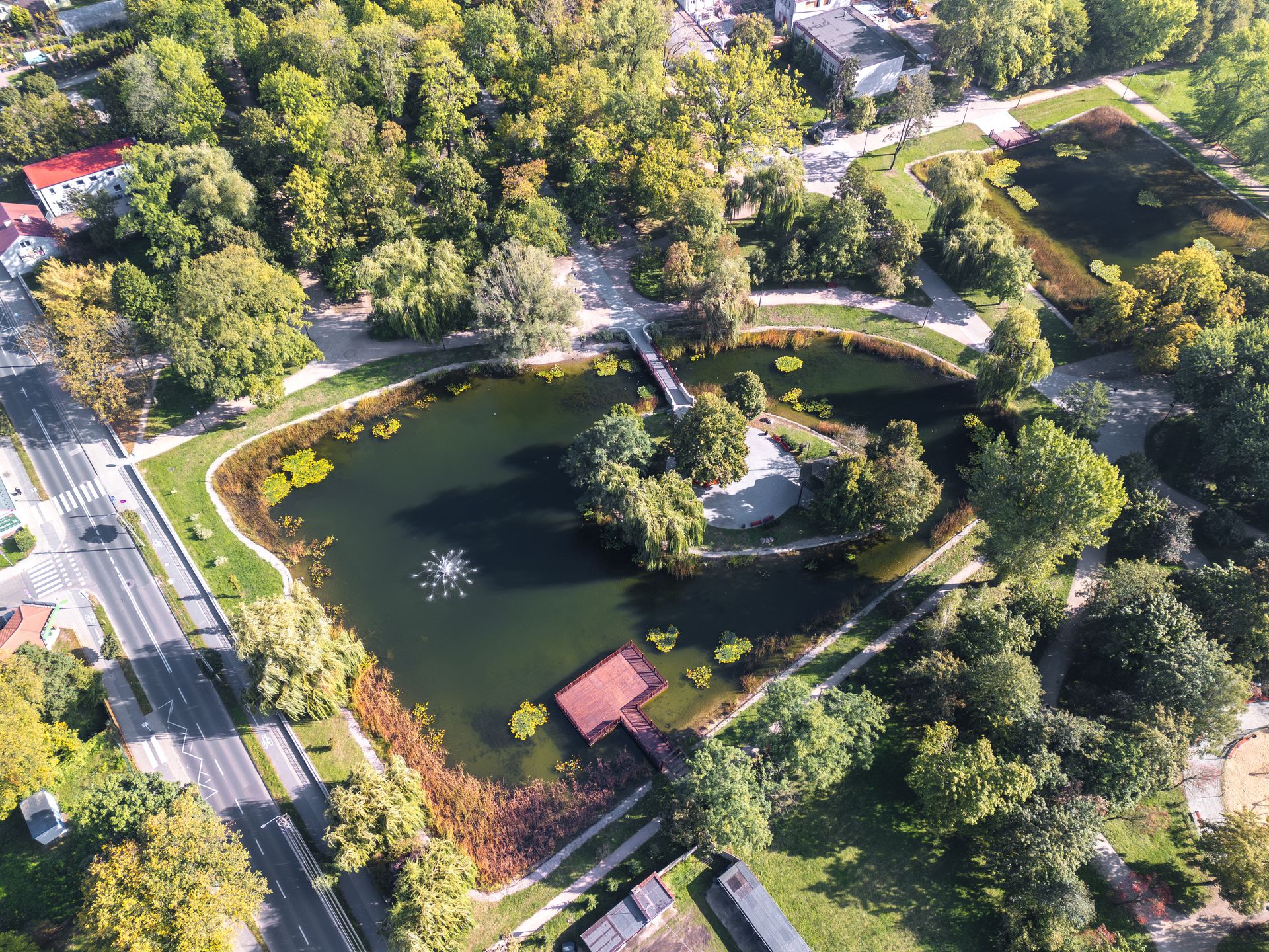zdunska wola, park, poland, aerial, travel, skyline, cityscape, landmark, panorama, panoramic, day, sunny, destination, city, summer, autumn, vacations, symbol, drone, view, architecture, town, old town, europe, historic, house, old, picturesque, sky, street, tourism, urban, landscape, scenic, sight, attraction, rooftop, downtown, famous place, green, nature, colorful, vibrant