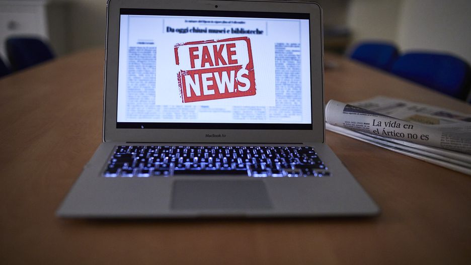 MADRID, SPAIN - NOVEMBER 06: In this photo illustration a person reads a fake news item on his laptop, on November 06, 2020 in Madrid, Spain. The government has approved an action procedure against so-called 'fake news' through which it will monitor the information and may request the collaboration of the media to pursue the "deliberate, large-scale and systematic dissemination of disinformation, which seeks to influence society for selfish and spurious purposes". (Photo illustration by Jesús Hellín/Europa Press via Getty Images)