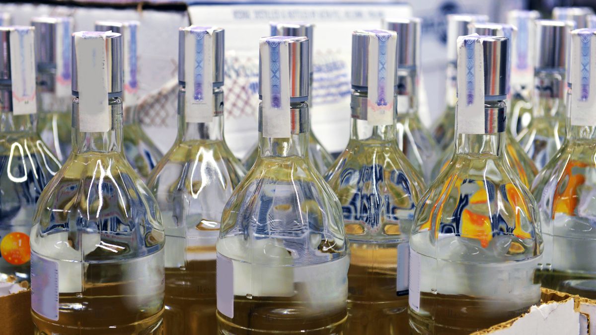 Vodka in a cardboard box in the store
alcohol, beverage, bottle, box, buy, case, celebration, drink, event, glass, market, marketplace, merchandise, product, retail, row, sale, sell, service, shelf, shop, store, supermarket, trade, vine, vodka, white, wine, winery