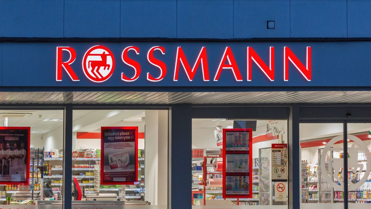 Rossmann store on city street in Nyiregyhaza, Hungary.NYIREGYHAZA, HUNGARY - JULY 26, 2019: Rossmann drug and perfume stope in the evening. Rossmann is Germanys second largest drug store with other 3,600 stores in Europe.rossmann, store, drug, retail, perfume, business, shop, street, sign, architecture, brand, city, design, entrance, europe, german, market, modern, signboard, urban, consumerism, discount, lifestyle, logo, public, red, sale, front, advertising, building, commercial, dark, display, exterior, facade, glass, outdoor, signage, supermarket, evening, twilight, rainy, weather, chain, nyiregyhaza, hungary, consumer, window, summer, famous, rossmann, store, drug, retail, perfume, business, shop, street, sign, architecture, brand, city, design, entrance, europe, german, market, modern, signboard, urban, consumerism, discount, lifestyle, logo, public, red, sale, front, advertising, building, commercial, dark, display, exterior, facade, glass, outdoor, signage, supermarket, evening, twilight, rainy, weather, chain, nyiregyhaza, hungary, consumer, window, summer, famous