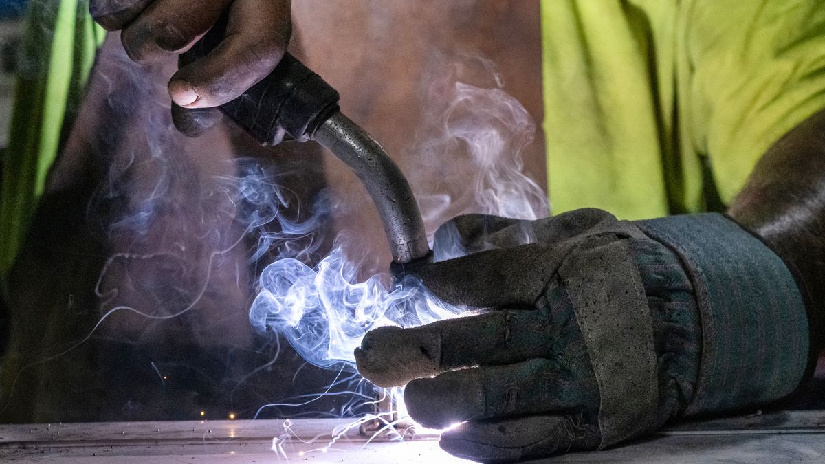 A worker arc welds a metal door during production at the Metal Manufacturing Co. facility in Sacramento, California, US, on Tuesday, May 27, 2025. The US Census Bureau is scheduled to release factory orders figures on June 3. Photographer: David Paul Morris/Bloomberg via Getty Images