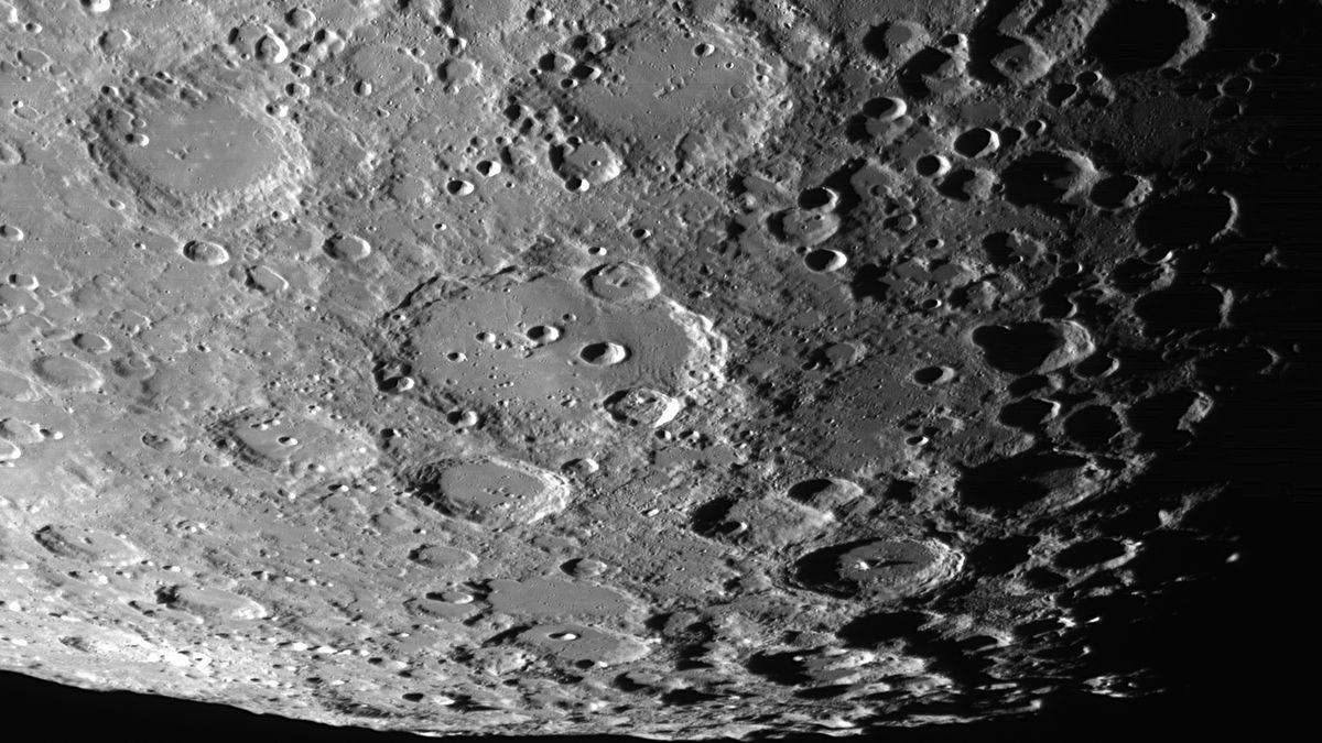 (EDITOR'S NOTE: Image was captured through a telescope using "lucky imaging" technique: this astrophotography technique captures short-exposure frames or videos, extracting and combining the best frames with specialized software for a sharper, detailed final image during stable atmospheric conditions.) Clavius, Porter, Blancanus, Scheiner, Maginus, Longomontanus, Moretus and Curtius and other craters are seen on the Moon through a telescope in L'Aquila, Italy on July 27th, 2024.  (Photo by Lorenzo Di Cola/NurPhoto via Getty Images)