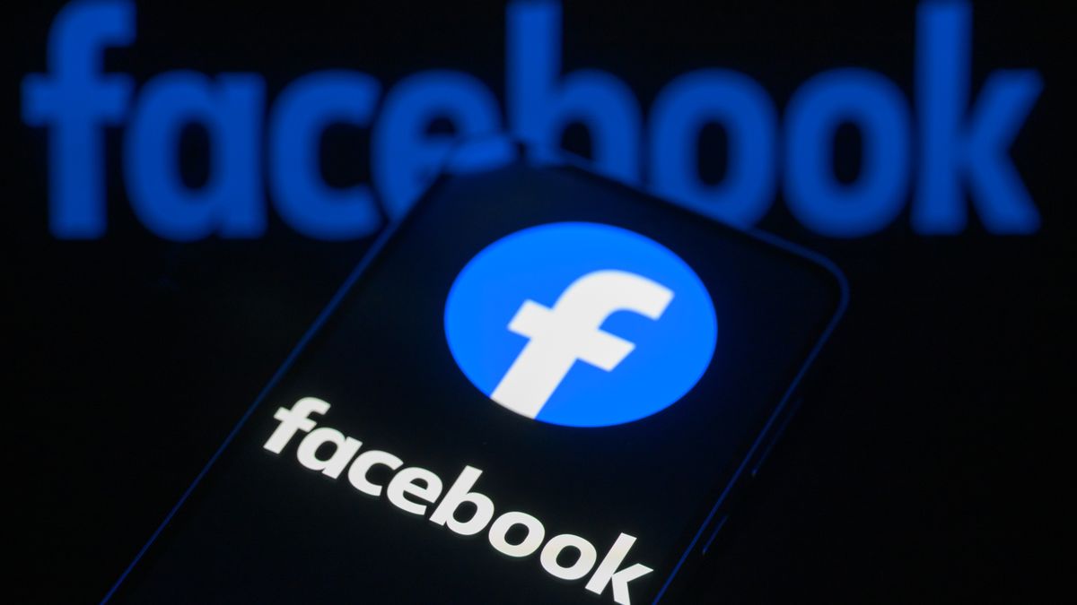 The Facebook logo is displayed on a smartphone screen in this photo illustration in Brussels, Belgium, on March 29, 2026. Meta Platforms expands its AI services while facing regulatory pressure in Europe over data use, competition rules, and access to rival AI tools. (Photo by Jonathan Raa/NurPhoto via Getty Images)