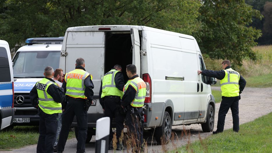 COTTBUS, GERMANY - SEPTEMBER 25: Police searching for illegal immigrants look inside a van at a checkpoint not far from the Polish border on September 25, 2023 near Cottbus, Germany. Germany has seen a strong uptick in the numbers of illegal immigrants arriving in recent months, especially along its eastern borders, which has led to political debates over setting a limit for annual asylum cases.  (Photo by Sean Gallup/Getty Images)