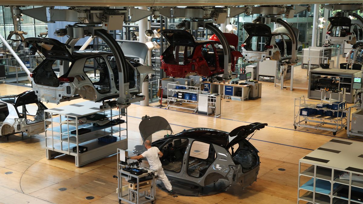 DRESDEN, GERMANY - MAY 14: Workers assemble Volkswagen ID.3 electric cars at the Volkswagen plant on May 14, 2025 in Dresden, Germany. Volkswagen led sales of electric car sales in Germany that rose 54% overall in April compared to April of last year. (Photo by Sean Gallup/Getty Images)