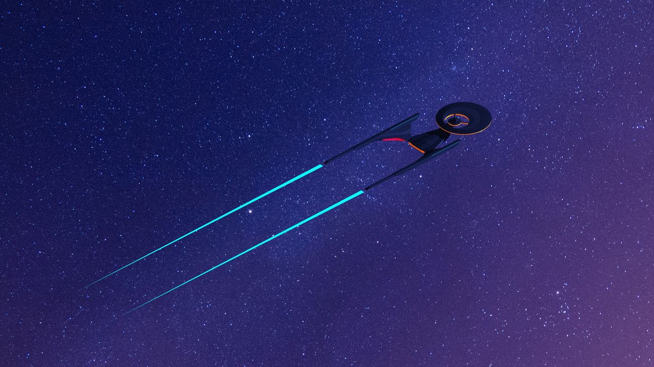 Wizualizacja statku Enterprise w przestrzeni kosmicznej Jowisza