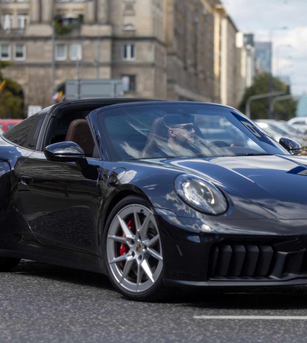Tomasz Kammel wozi się porsche