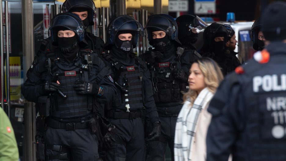 Police officers are observing the pro-Palestinian demonstration at Neumarkt Square in Wuppertal, Germany, on November 11, 2023, as Germany restricts the pro-Palestinian protest. (Photo by Ying Tang/NurPhoto via Getty Images)