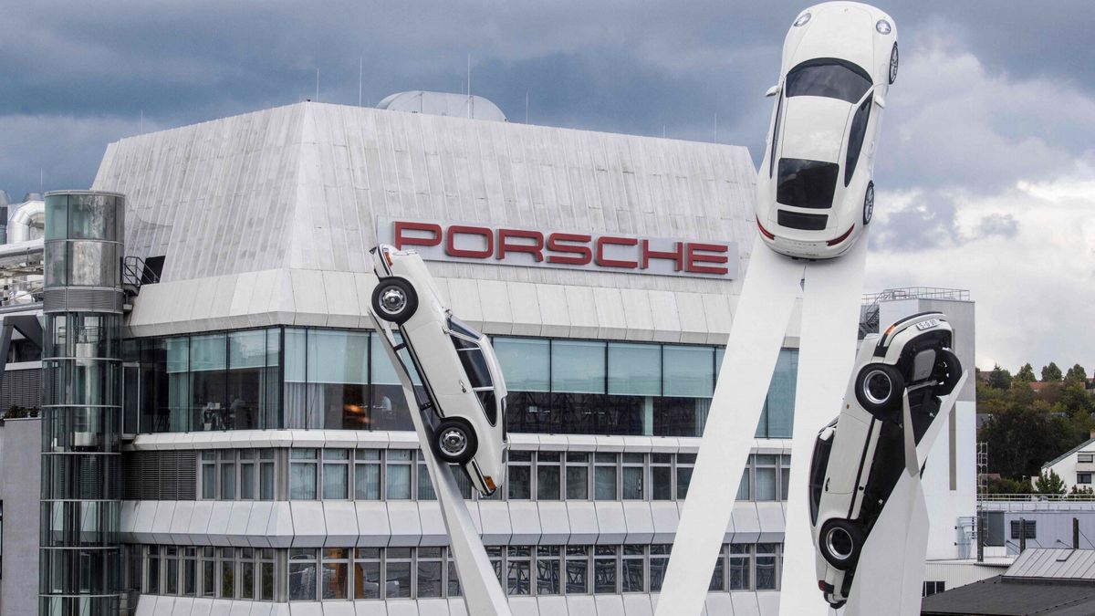 TemporaryThe sculpture "Inspiration 911"  by British artist Gerry Judah, showing three Porsche 911 of different generations,   stands in front of the headquarters of German sports car producer  Porsche AG  in Stuttgart, southern Germany, on September 26, 2022. (Photo by THOMAS KIENZLE / AFP)THOMAS KIENZLE
