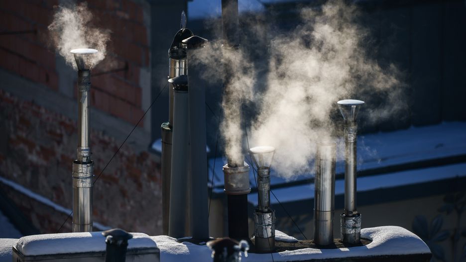 Chimney smoke during smog standards many times exceeded. Krakow, Poland on January 10, 2024. Due to the PM10 particles passing the average acceptable daily concentration, Krakow's city public transport was announced free of charge for the whole 24 hours. (Photo by Beata Zawrzel/NurPhoto via Getty Images)