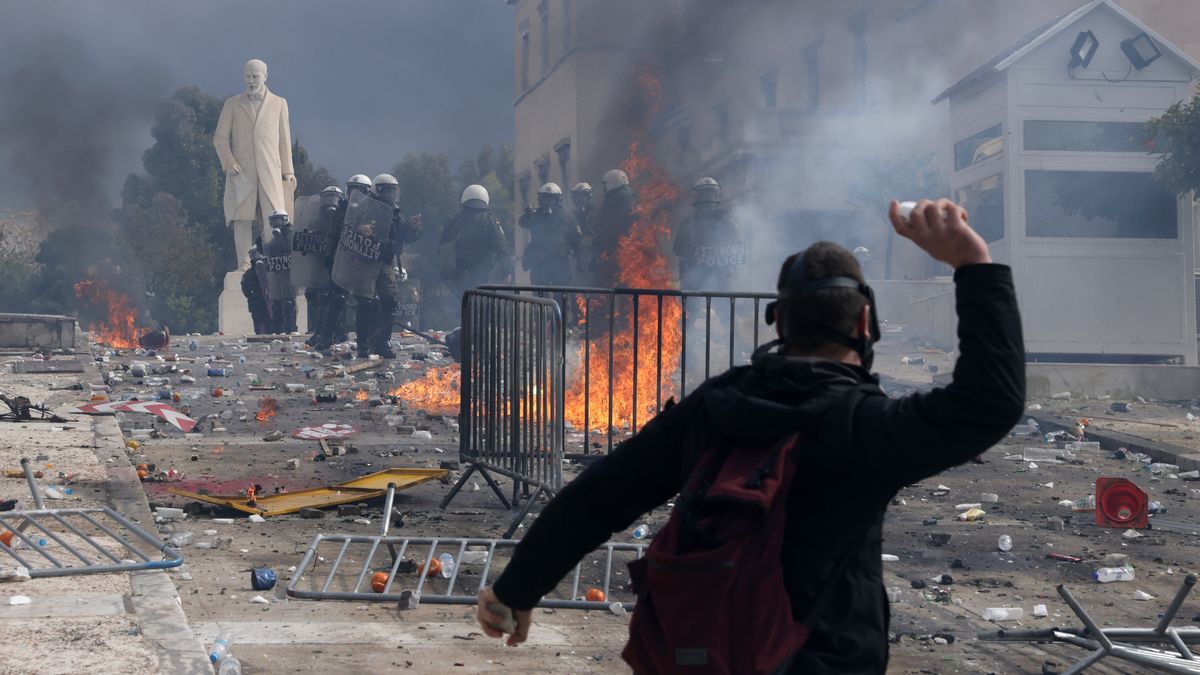 ATHENS, GREECE - FEBRUARY 28: Clashes erupt between protesters and riot police during a demonstration marking the second anniversary of 2023 train collision that resulted in 57 deaths on February 28, 2025 in Athens, Greece. (Photo by Costas Baltas/Anadolu via Getty Images)