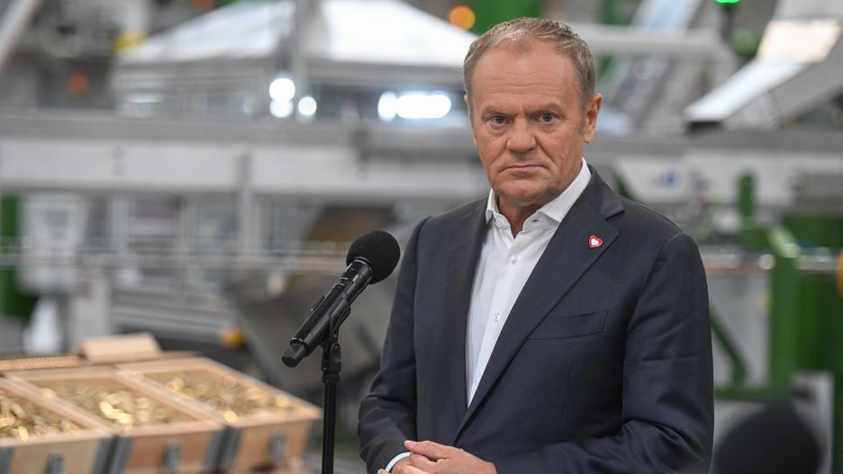 SKARZYSKO-KAMIENNA, POLAND - JUNE 13: Poland's Prime Minister, Donald Tusk delivers a speech and answers journalist's questions during the opening of Mesko SA's New Ammunition Production Hall on June 13, 2025 in Skarzysko-Kamienna, Poland. Polish Prime Minister Donald Tusk is attending the opening of a new hall for theproduction of small-caliber ammunition at Mesko SA, Polish manufacturer of ammunition and missiles. The new 4,000 square meter facility is part of 'Project 400,' aimed at increasing production capacity with four automated production lines for pistol and rifle ammunition, increasing Mesko's production capacity to 250 million pieces of ammunition per year. A number of European countries, including Poland, have significantly increased defense spending and weapons production as Russia's war in Ukraine stirs fears around security, and as US military support for Europe waivers under President Donald Trump's administration. (Photo by Omar Marques/Getty Images)