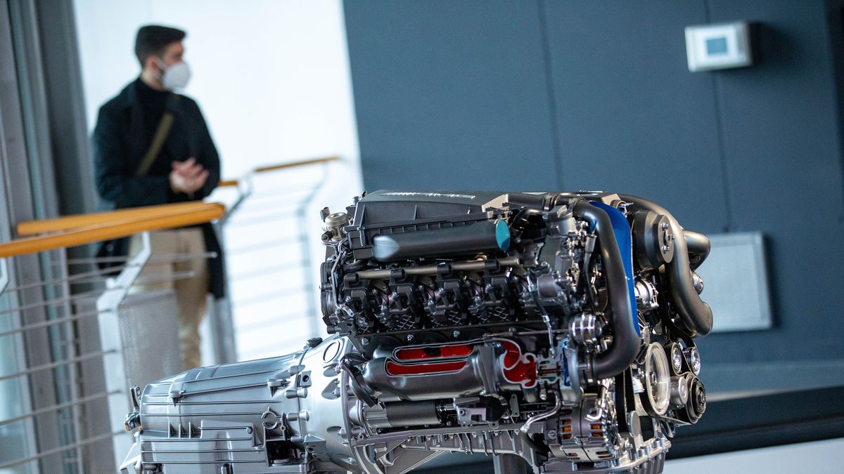A Mercedes-Benz AMG 5.5 litre V8 Biturbo combustion engine and transmission system on display inside a Mercedes-Benz AG showroom in Berlin, Germany, on Tuesday, Feb. 24, 2022. Mercedes-Benz expects profitability at its main cars division to slip this year as the German manufacturer sees more drag from supply-chain snarls and a surge in raw-material costs. Photographer: Krisztian Bocsi/Bloomberg via Getty Images