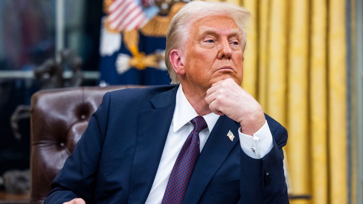 US President Donald Trump with an executive order during a signing ceremony in the Oval Office of the White House in Washington, DC, US, on Monday, Jan. 20, 2025. President Donald Trump launched his second term with a strident inaugural address that vowed to prioritize Americas interests with a "golden age" for the country, while taking on "a radical and corrupt establishment." Photographer: Jim Lo Scalzo/EPA/Bloomberg via Getty Images
