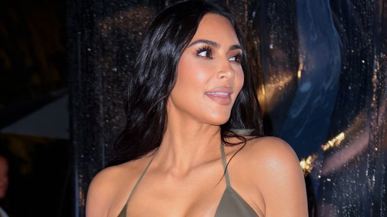 Kim Kardashian poses in a bikini