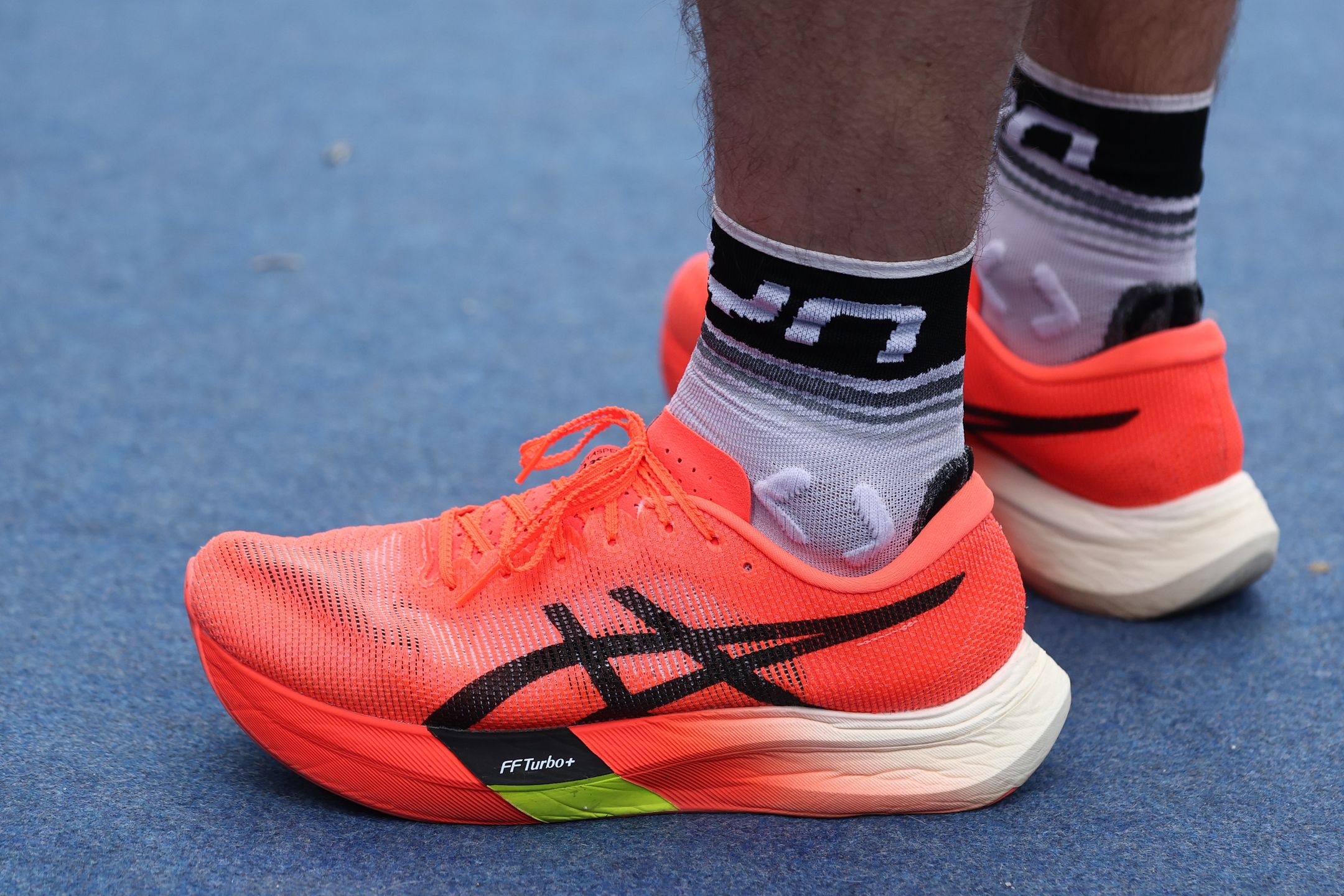 Asics Metaspeed Sky Paris U shoes wearing by a runner are seen during Cracovia Maraton in Krakow, Poland on April 6, 2025. (Photo by Jakub Porzycki/NurPhoto via Getty Images)