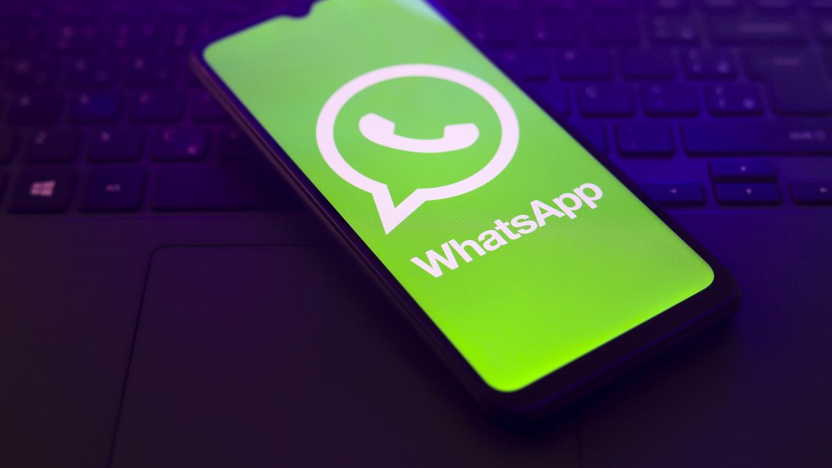 The WhatsApp logo appears on the screen of a smartphone that is on top of the laptop keyboard in Reno, United States, on November 28, 2024. (Photo by Jaque Silva/NurPhoto via Getty Images)