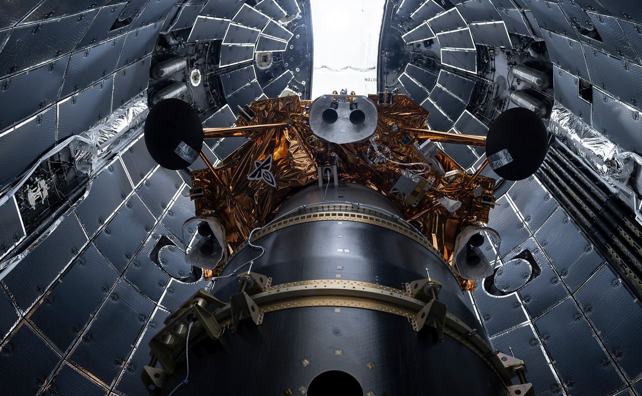 Cargo space of the SpaceX rocket. The Blue Ghost lander is visible installed over the container with the Resilience lander.