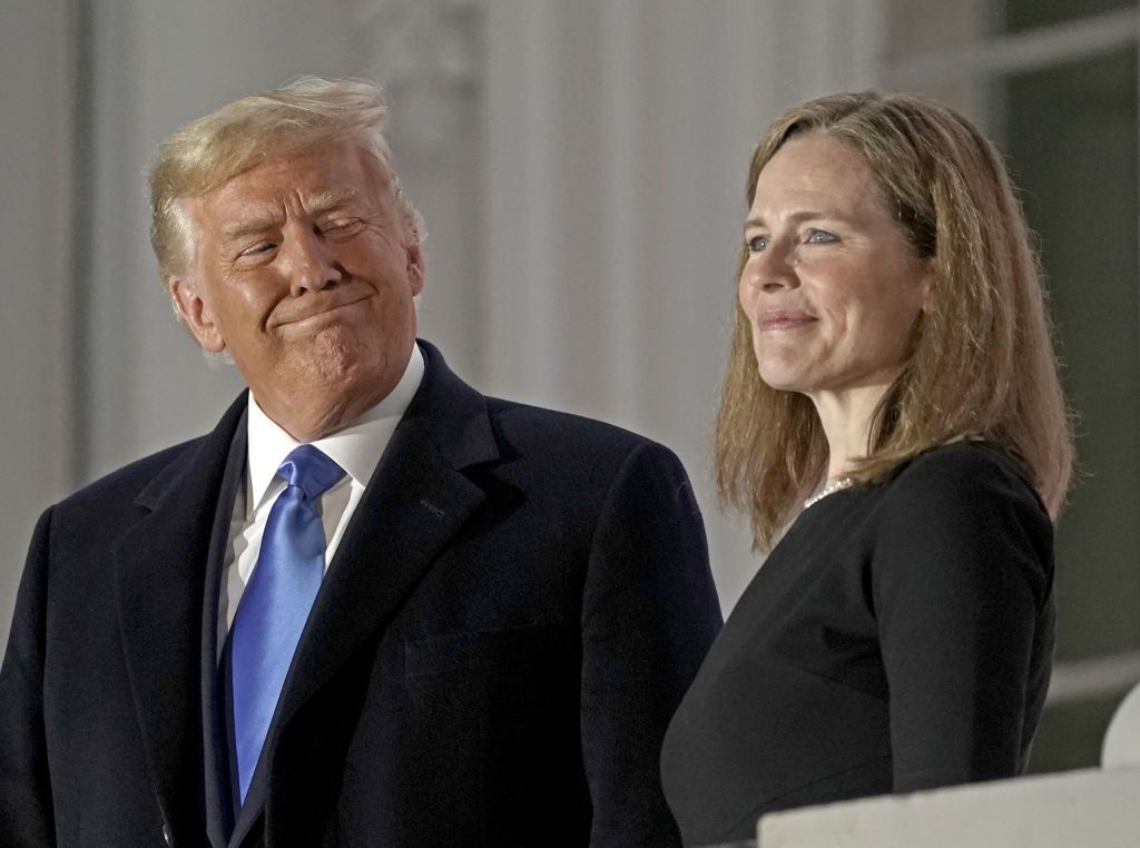 File:The Best Of U.S. President Donald TrumpFILE: Bloomberg Best Of U.S. President Donald Trump 2017 - 2020: U.S. President Donald Trump, left, and Amy Coney Barrett, associate justice of the U.S. Supreme Court, stand on a balcony during a ceremony on the South Lawn of the White House in Washington, D.C., U.S., on Monday, Oct. 26, 2020. Our editors select the best archive images looking back at Trumps 4 year term from 2017 - 2020. Photographer: Ken Cedeno/CNP/Bloomberg via Getty ImagesBloombergu.s.a., americas, 2017-2020, us, 2020uspolitics, the white house, u.s. government, north american, american, united states of america