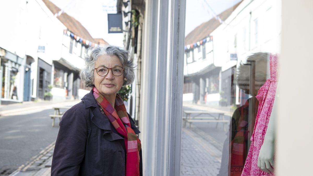 Woman standing outside a shop window in an old English town
Part of a series - Adults having a fun day out together in St Albans, England
Peter Carruthers