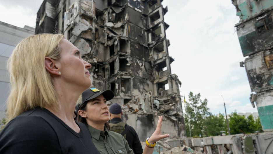 TemporaryU.S. ambassador to Ukraine Bridget Brink, left, listens to Ukraine's Prosecutor General Iryna Venediktov during a tour of a destroyed area in Borodyanka, outskirts of Kyiv, Ukraine, Saturday, June 4, 2022. (AP Photo/Natacha Pisarenko)AP