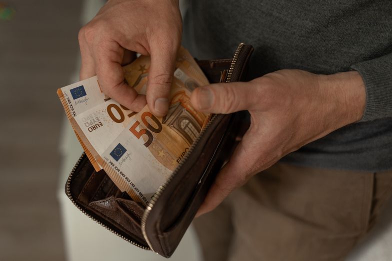 money, hand, business, currency, cash, finance, holding, dollar, hands, bank, euro, banknote, bill, pay, buy, wealth, dollars, banking, financial, debt, human, paying, shopping, giving, paper