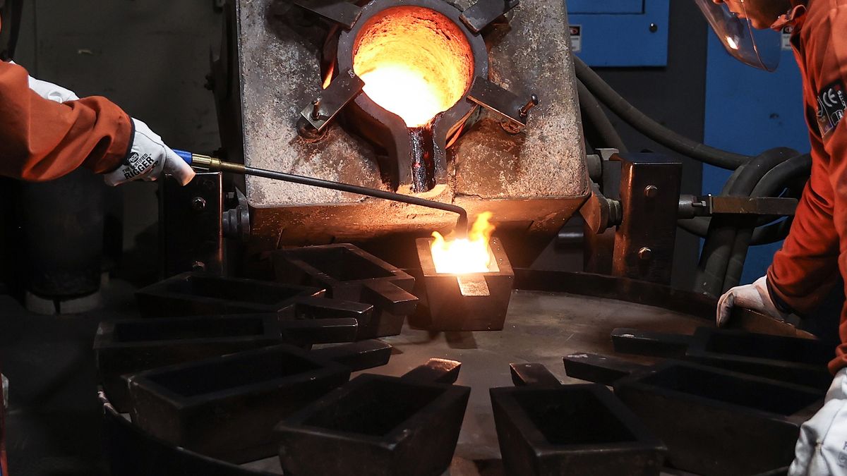 Workers pour melted gold into moulds at the ABC Refinery smelter in Sydney, Australia, on Friday, May 3, 2024. Gold edged higher after mixed signals from the US, where optimism is growing the economy is on target for a soft landing as the Federal Reserve fights inflation. Photographer: Brendon Thorne/Bloomberg via Getty Images