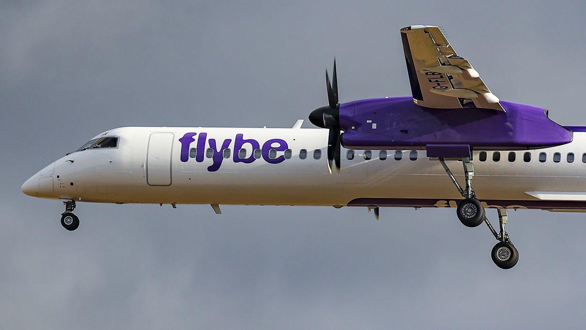 Regional UK based Flybe airline ceased operations, flights, trading and entered administration on 28 January 2023 as the UK Civil Aviation Authority has announced. All flights cancelled. Passengers were advised not to go to the airports. The British regional airline operated scheduled services from Birmingham, Belfast City and Heathrow to airports in the UK, Amsterdam and Geneva. The aircraft in the picture is a Bombardier DHC-8-400 turboprop airplane with the registration G-FLBA as seen flying for landing during a cloudy day at London Heathrow LHR airport. London, United Kingdom on August 2022 (Photo by Nicolas Economou/NurPhoto via Getty Images)