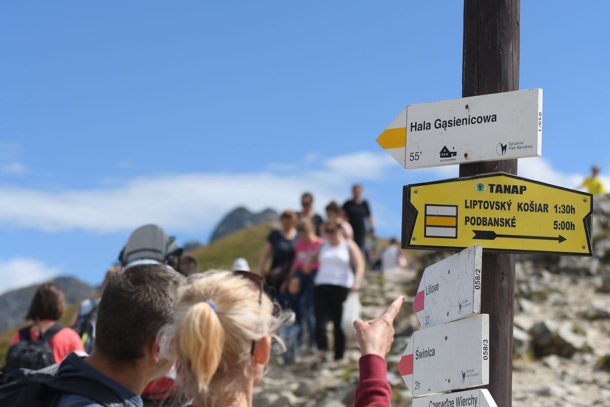 Signs with directions from the top of Kasprowy Wierch pic.
Thanks to the sunny weather at the end of summer holidays, the Tatra trails are under siege with hikers and tourists.
On Monday, August 19, 2019, in Zakopane, Lesser Poland Voivodeship, Poland. (Photo by Artur Widak/NurPhoto via Getty Images)