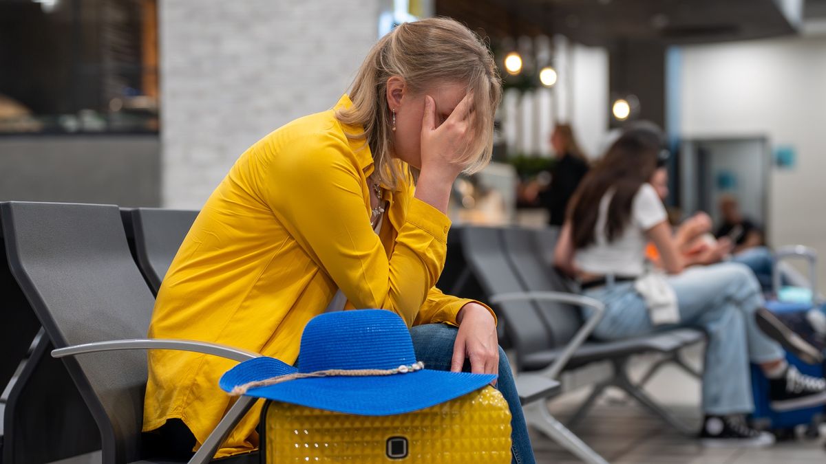Woman missed her flight or it was cancelled.Woman missed her flight or it was cancelled.M-Productiongirl, female, international, late, departure, terminal, missed, canceled, lag
