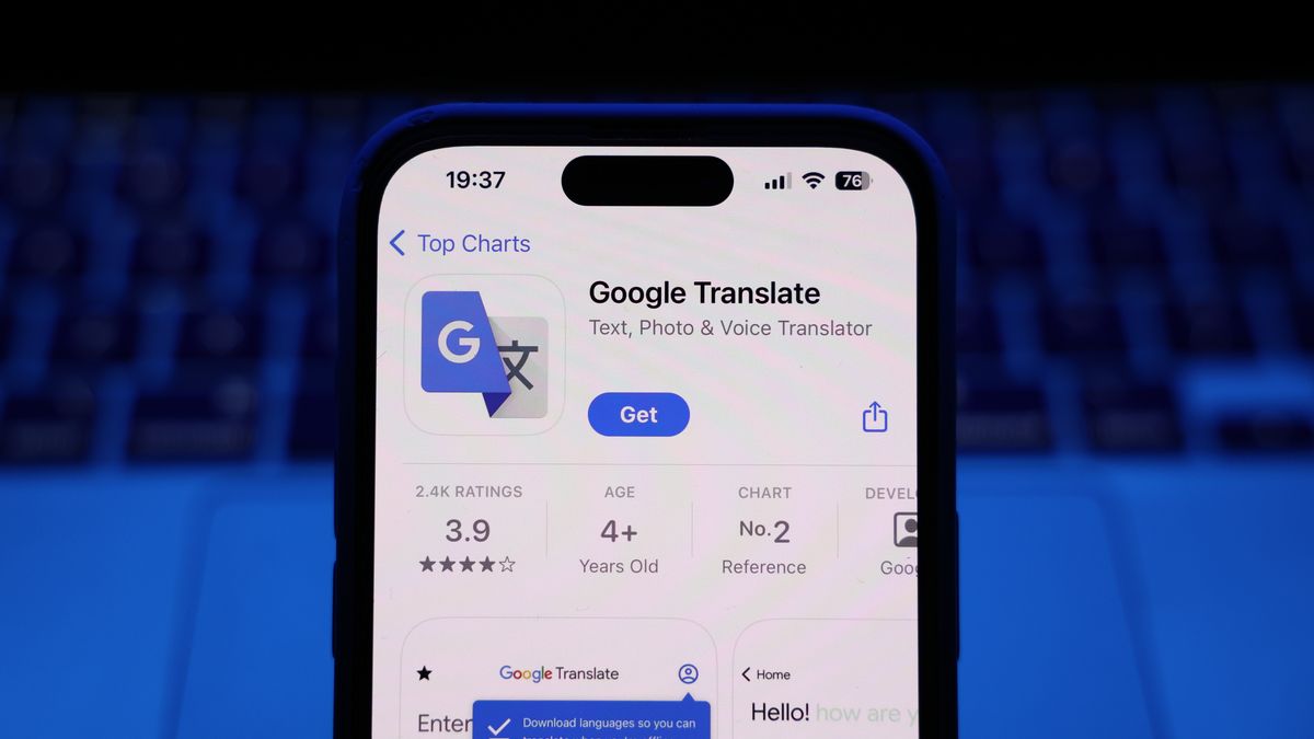 A laptop keyboard and Google Translate on App Store displayed on a phone screen are seen in this illustration photo taken in Krakow, Poland on March 17, 2025. (Photo by Jakub Porzycki/NurPhoto via Getty Images)