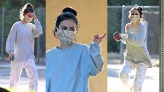 Zamaskowana Selena Gomez podskakuje na korona-spacerze i grozi komuś palcem (ZDJĘCIA)