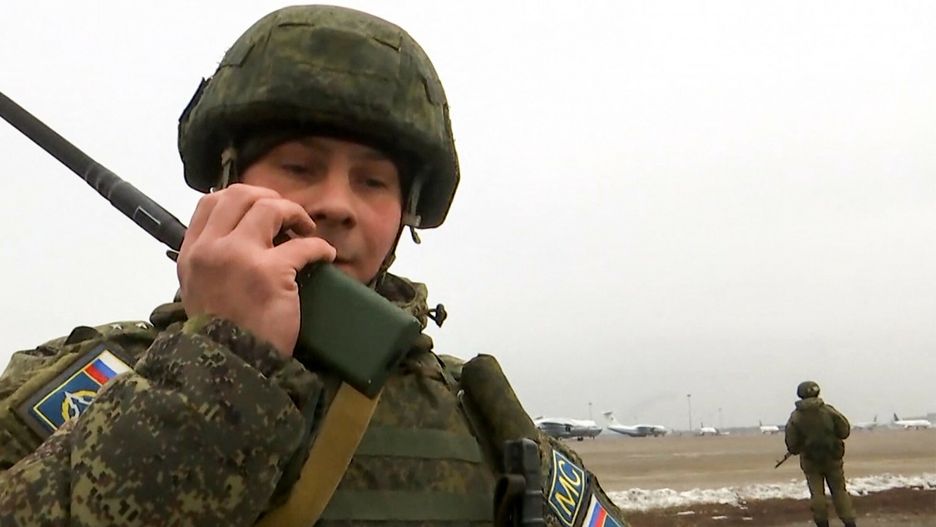 TemporaryThis handout picture taken and released by the Russian Defence Ministry on January 11, 2022 shows Collective Security Treaty Organization's (CSTO) Russian soldiers standing guard at the Almaty airport. - In Kazakhstan's largest city a Russia-led peacekeeping force sent to restore order after clashes that left dozens dead is making its presence felt, despite being all but invisible to citizens. (Photo by Handout / Russian Defence Ministry / AFP) / RESTRICTED TO EDITORIAL USE - MANDATORY CREDIT "AFP PHOTO / Russian Defence Ministry " - NO MARKETING - NO ADVERTISING CAMPAIGNS - DISTRIBUTED AS A SERVICE TO CLIENTSHANDOUT