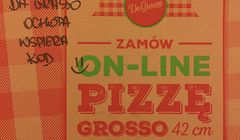 Da Grasso odcina się od napisu wspierającego demonstrantów przed Sejmem. „Pizzę dostarczamy wszystkim”
