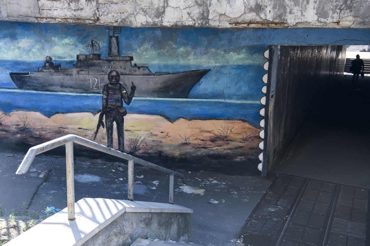 Mural with the iconic ukrainian postage stamp of a Ukrainian soldier gesturing towards a Russian warship off Snake Island is seen on the wall in Kyiv, Ukraine, July 01, 2022 (Photo by Maxym Marusenko/NurPhoto via Getty Images)