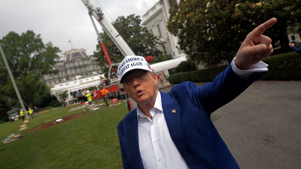 WASHINGTON, DC - JUNE 18: U.S. President Donald Trump talks to reporters as workers install a new flag pole on the South Lawn of the White House on June 18, 2025 in Washington, DC. Trump said that he personally paid for the pole and another just like it on the North Lawn and their installations. (Photo by Chip Somodevilla/Getty Images)