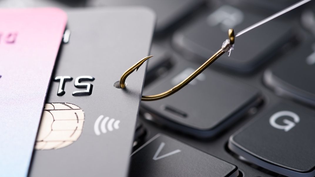 Credit card on fishing hook pulled from stack on keyboard, phishing scam data theft conceptfraud,card,credit,debit,online,email,hook,phishing,spam,crime,financial,malware,protection,internet,mail,phish,cyber,attack,money,stolen,steal,theft,hacker,electronic,data,line,thieve,vulnerability,leak,keyboard