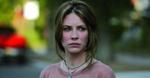 ''Hobbit'': Rudowłosa Evangeline Lilly strzela z łuku [foto]