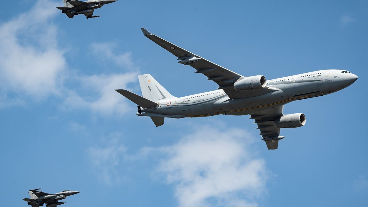 An Airbus A330 MRTT and two F-16 fly jets during the Polish Army Parade in Warsaw, Poland, on Friday, Aug. 15, 2025. Poland inked a $3.8 billion deal to modernize its existing fleet of F-16 fighter jets to better deter potential Russian aggression. Photographer: Damian Lemanski/Bloomberg via Getty Images
