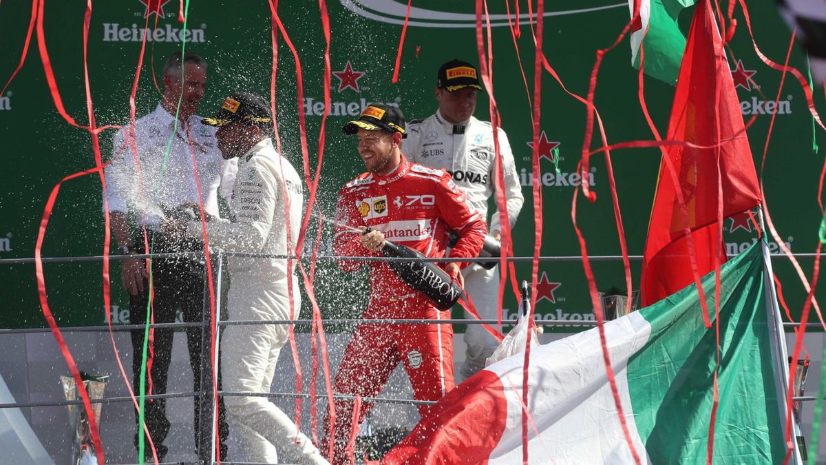 Lewis Hamilton, Valtteri Bottas i Sebastian Vettel świętują podium na Monzy