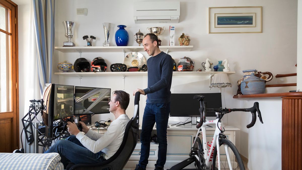 Robert Kubica w swoim domu z Alessandro Petacchim